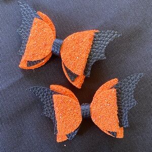 Two Paparazzi Sparkling Orange and Black Hair Bows